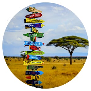 a sign in africa with lots of locations marked on it