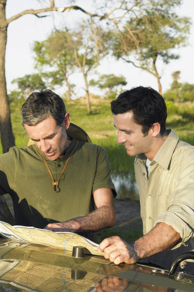 2 people looking at a map